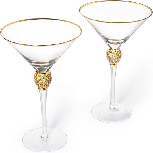 Two martini glasses with gold embellishments on a white background