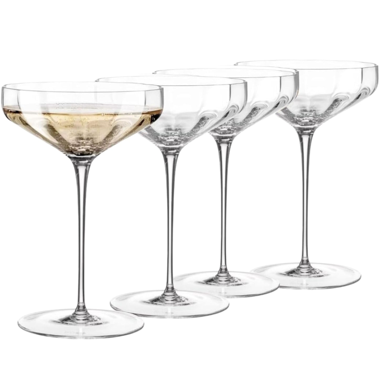 Set of four clear cocktail glasses with one containing a light-colored liquid on a white background