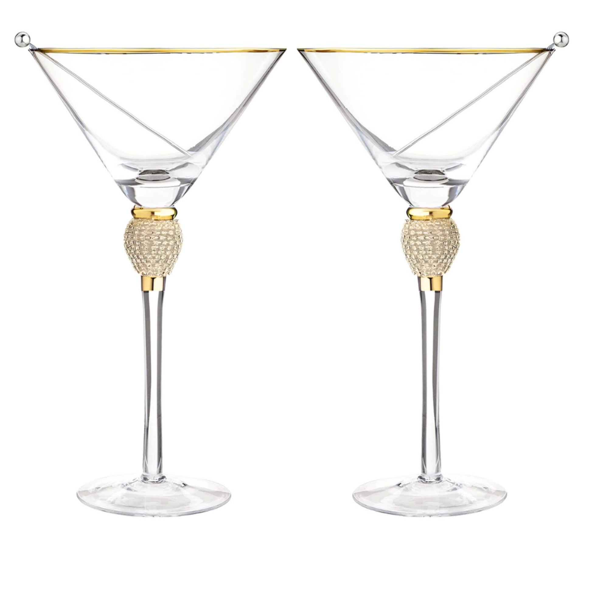 Two martini glasses with gold accents on a white background