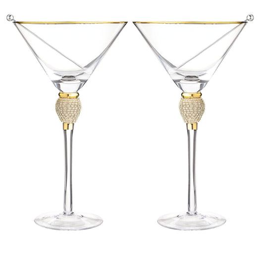 Two martini glasses with gold accents on a white background