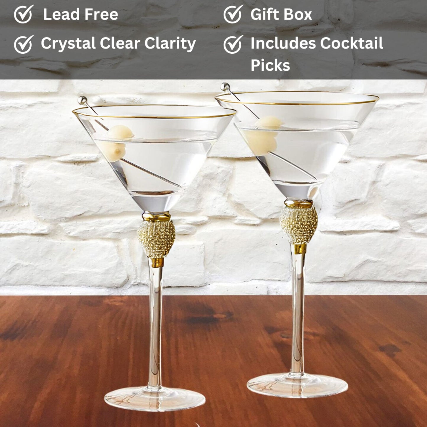 Two crystal clear martini glasses with gold bases on a wooden surface, featuring text about product features.
