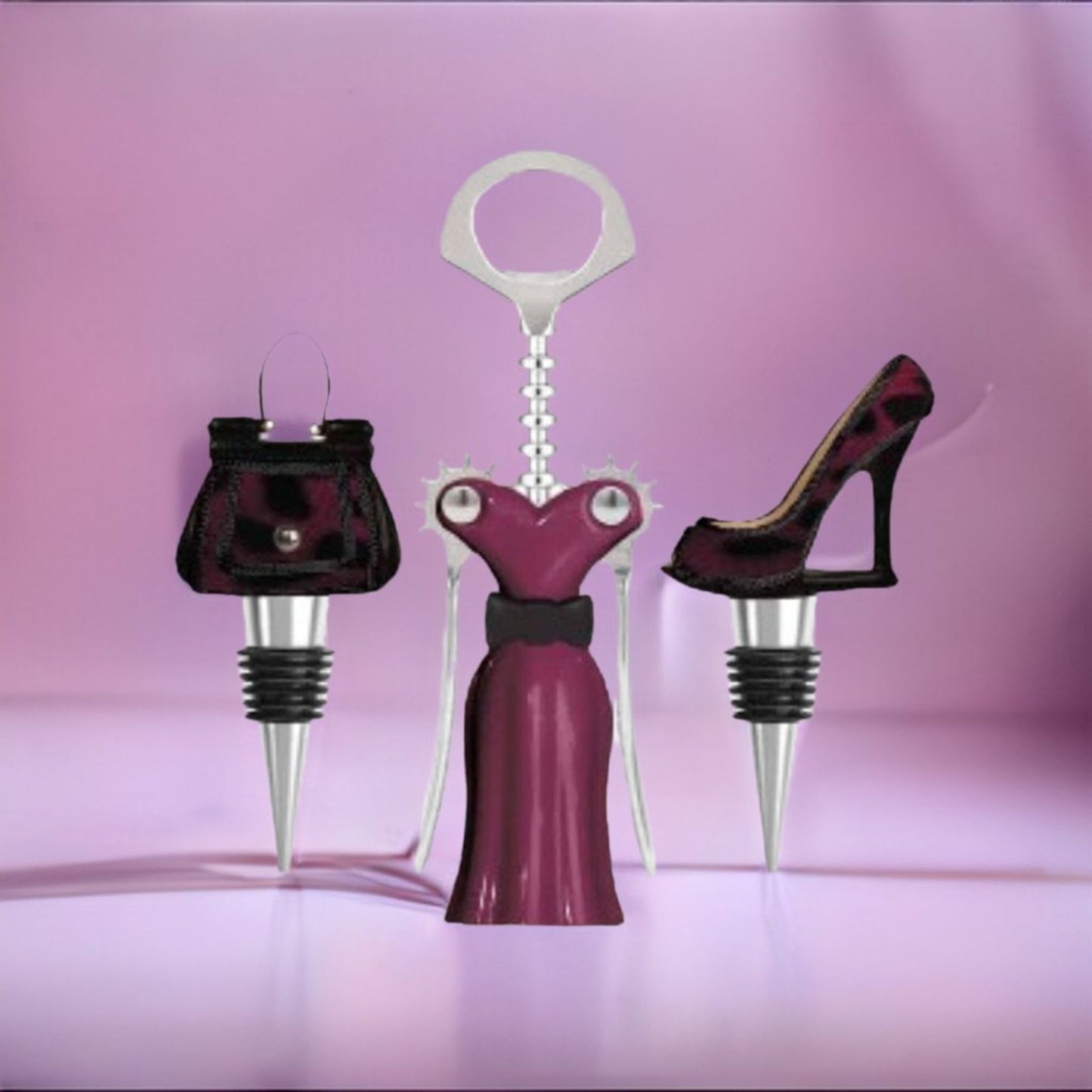 Three unique wine bottle stoppers shaped like a handbag, dress, and high heel on a pink background.