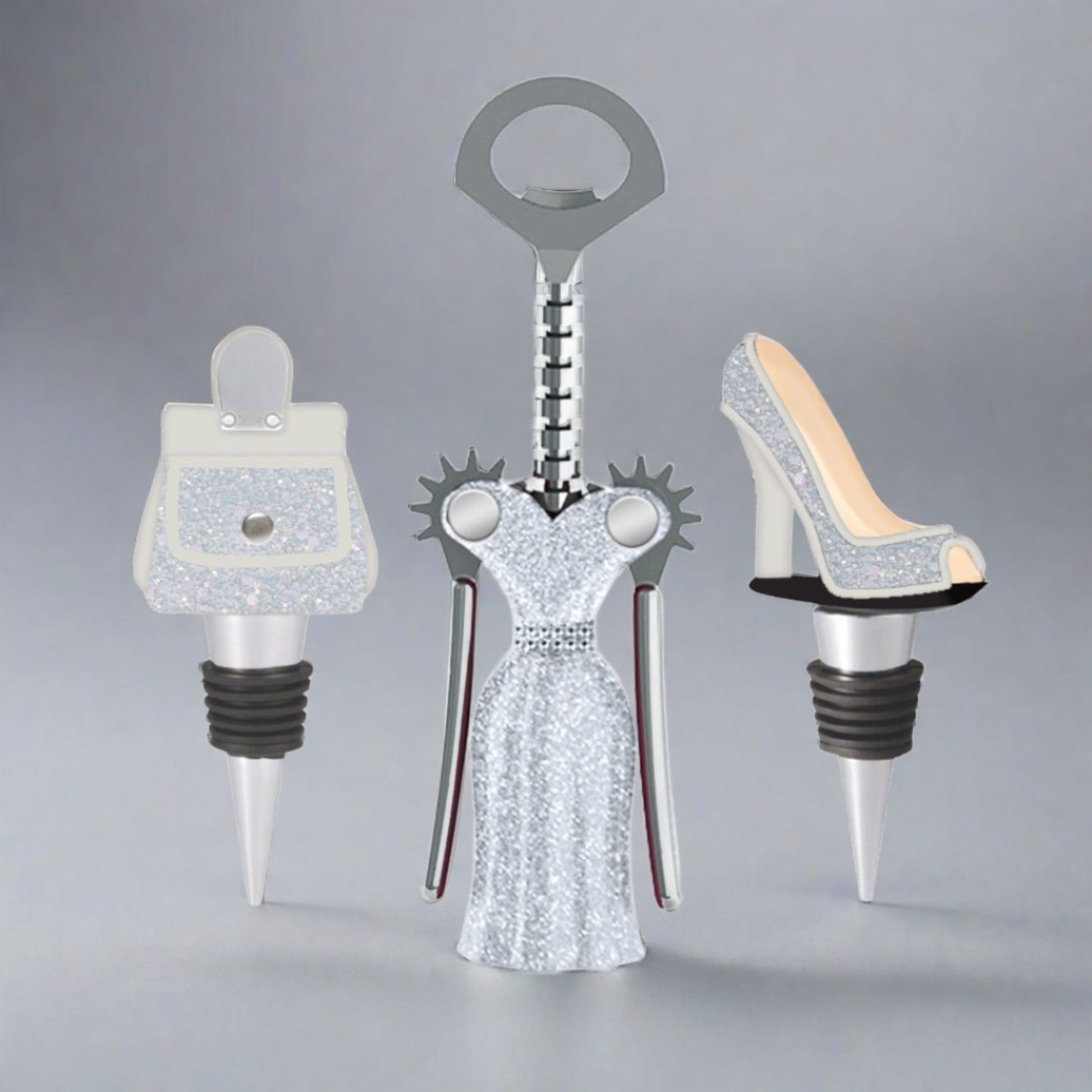 Three unique bottle stoppers shaped like a handbag, dress, and high heel on a gray background.