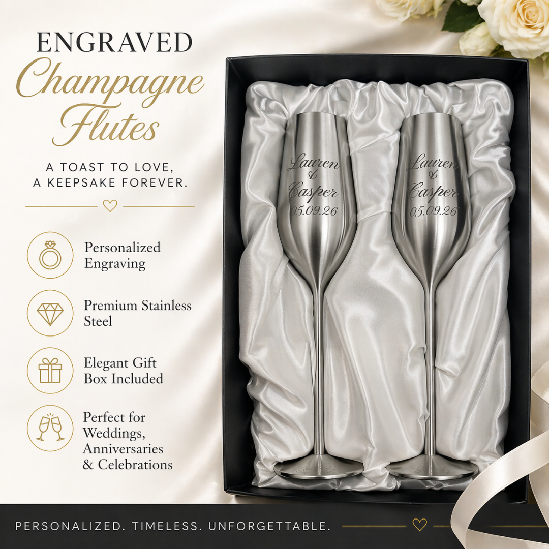 Two engraved champagne flutes in a satin-lined box with product details on a white background.