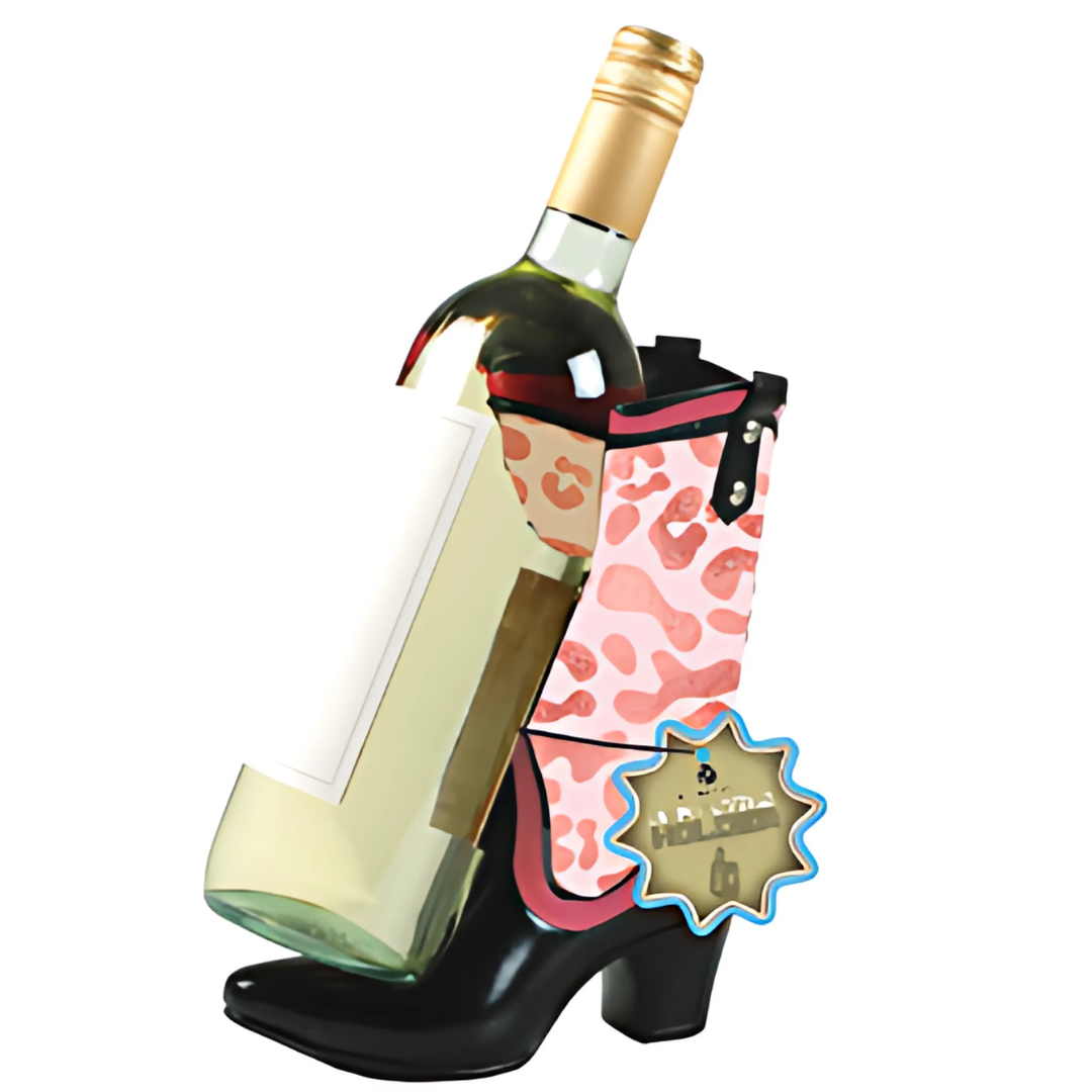 Wine bottle holder shaped like a black high-heeled shoe with pink leopard print design on a white background.