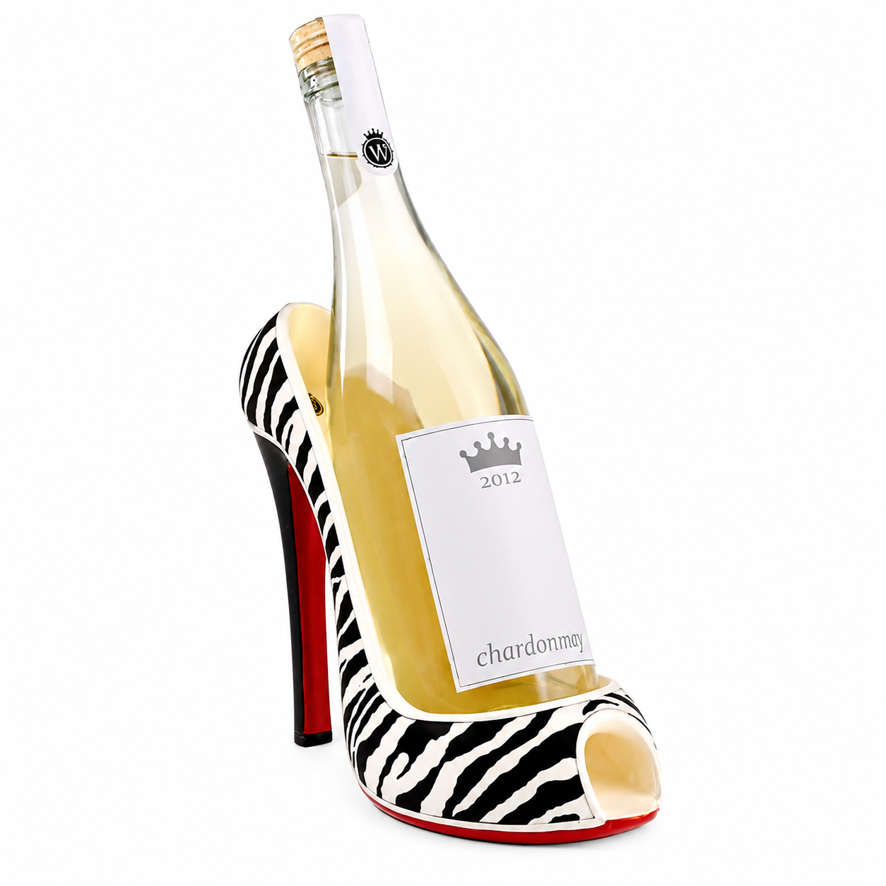 A novelty wine bottle shaped like a high-heeled shoe, filled with white wine. The shoe design features a black and white zebra print upper, a white label with a crown graphic and the word 'chardonnne', and a red sole and heel.